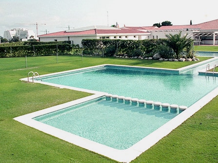 Coronaciónd de piscina Menorca en Piedra Artificial