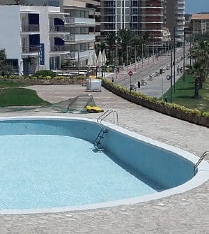 Rehabilitación de piscina en piedra artificial