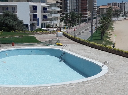 Rehabilitación de piscina en piedra artificial
